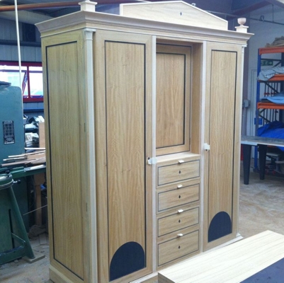 Wardrobe unit in Satinwood with Ebony inlays being made for The Goring Hotel, London