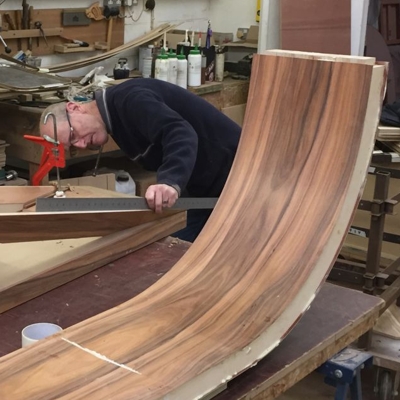 Constructing rosewood table base in the workshop